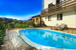 Bazén v ubytování Guesthouse Pavlin nebo v jeho okolí