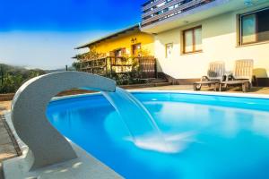 Bazén v ubytování Guesthouse Pavlin nebo v jeho okolí