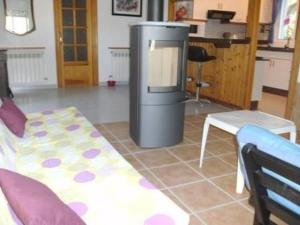 a living room with a tv and a couch at Holiday Home Casa Blumer by Interhome in Les tres Cales +36 photos