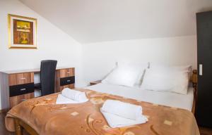 Postel nebo postele na pokoji v ubytování Guesthouse Pavlin