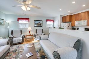a living room with a couch and two chairs at Unbeatable Downtown Location! Bar Harbor Apt in Bar Harbor