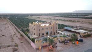 an aerial view of a building in the desert at Palm Garden in Erfoud