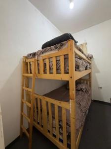 a couple of bunk beds in a room at Faraya chalet in Fārayyā