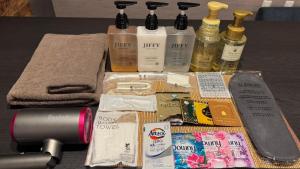 a table with a bunch of products on it at Stay Hakata in Fukuoka