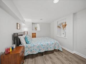 a bedroom with a bed and a desk in it at May House in Washington, D.C.