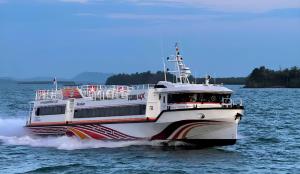 a ferry boat on the water at Gilibooking tickets in Padangbai