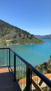 a balcony with a view of a body of water at Bayheights in Picton