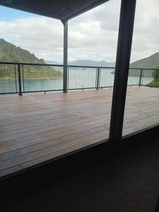 a view of a deck with a view of the water at Bayheights in Picton +6 photos