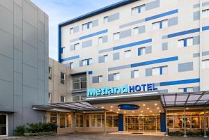 a rendering of the exterior of a methanopoulos hotel at Metland Hotel Bekasi in Bekasi