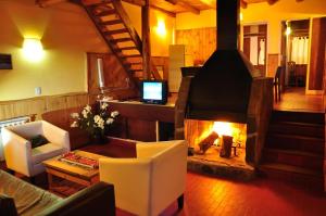 Ο χώρος του lounge ή του μπαρ στο Hotel y Cabañas del Nevado