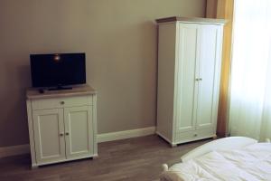 TV a/nebo společenská místnost v ubytování Dwie Wieże