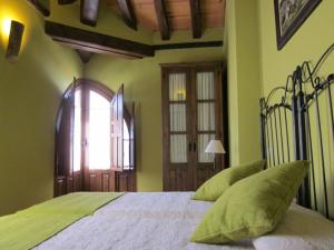 Posteľ alebo postele v izbe v ubytovaní Casa Rural Las Albertas