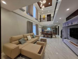 a living room with a couch and a table at Casa Marangle Private Villa in Mexico