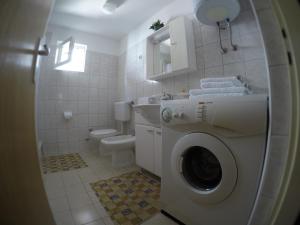Kúpeľňa v ubytovaní Apartment Donat + 37 fotografií