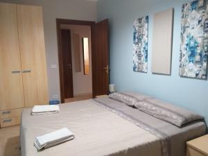 เตียงในห้องที่ Dabliu House