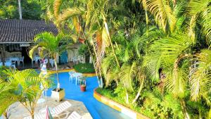 Um jardim em Pousada Atobá Juquehy Apartamentos