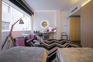 Postel nebo postele na pokoji v ubytování Adelphi Hotel + 37 fotografií