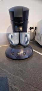 a coffee maker sitting on top of a counter at Étoiles et Désirs in Kermaria-Sulard
