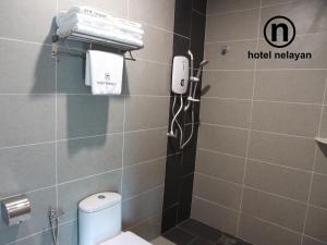 Koupelna v ubytování Hotel Nelayan