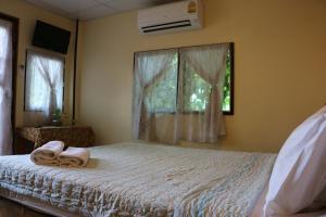 Imagen de la galería de Noom Guesthouse, en Lopburi