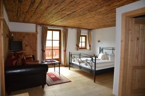 Postel nebo postele na pokoji v ubytování Berggasthof Steckholzer