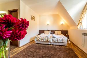 Postel nebo postele na pokoji v ubytování Family Hotel Teteven