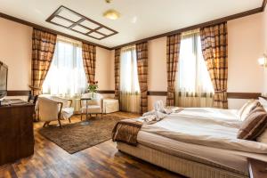 Postel nebo postele na pokoji v ubytování Family Hotel Teteven