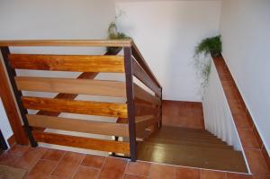 Palanda nebo palandy na pokoji v ubytování Apartmany U Stareho Labe