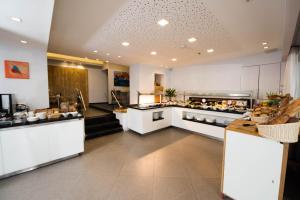 Kuchyň nebo kuchyňský kout v ubytování Montefiore Hotel By Smart Hotels + 34 fotografií