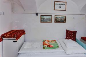 Postel nebo postele na pokoji v ubytování Barokk Vendégház