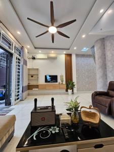 a large living room with a ceiling fan at Miha Villa 3 - House in Can Tho in Can Tho