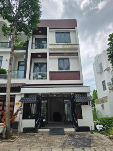 a building with the front door open at Miha Villa 3 - House in Can Tho in Can Tho
