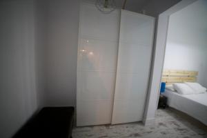 A bed or beds in a room at Apartments Madrid Las Letras