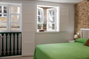 Cama o camas de una habitación en Pensión Rua Nova