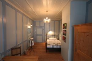 Postel nebo postele na pokoji v ubytování Hotel Restaurant Schwert Thun