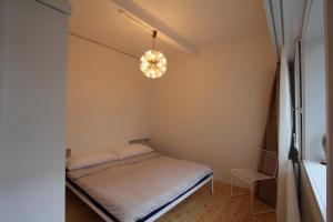 Postel nebo postele na pokoji v ubytování Hotel Restaurant Schwert Thun