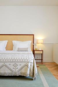 Cama ou camas em um quarto em Pousada da Serra da Estrela