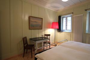 Postel nebo postele na pokoji v ubytování Hotel Restaurant Schwert Thun