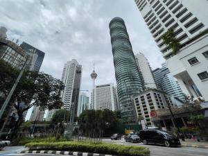 a view of a city with tall buildings at VORTEX SUITES KLCC By SKYLINE in Kuala Lumpur