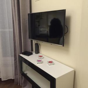 Μια τηλεόραση ή/και κέντρο ψυχαγωγίας στο Appartement dans Le Marais