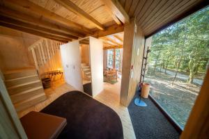 a room with a large window in a house at Torre de Gomariz Wine & Spa Hotel in Braga +47 photos