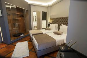 Postel nebo postele na pokoji v ubytování Solun Hotel & SPA