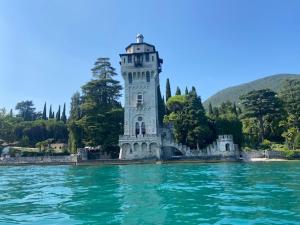 a building in the middle of a body of water at La Terasa del Cichino in Roe