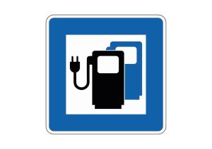 a blue and white sign with a gas pump at Frieda in Zingst
