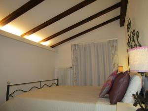 A bed or beds in a room at Il Borghetto