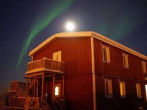 a house with a light on top of it at Laplanders room 2 in Kiruna