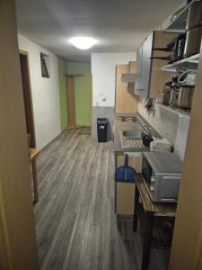 a kitchen with a sink and a counter top at Monteurzimmer 1 in Frielendorf