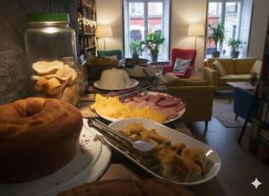 a table with plates of food on a table at Origem Bahía in Salvador