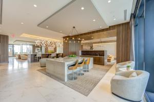 a lobby with a dining and living room at Hanover River Oaks in Houston