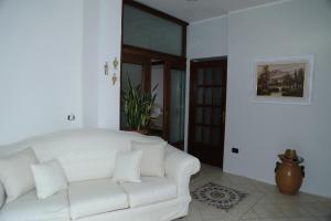 Posezení v ubytování B&B Maison Blanche